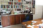 Pained curved corner bookcase with American black walnut doors